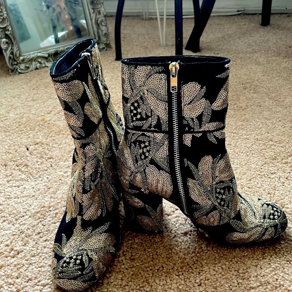 Metallic floral embossed boot with a gold design